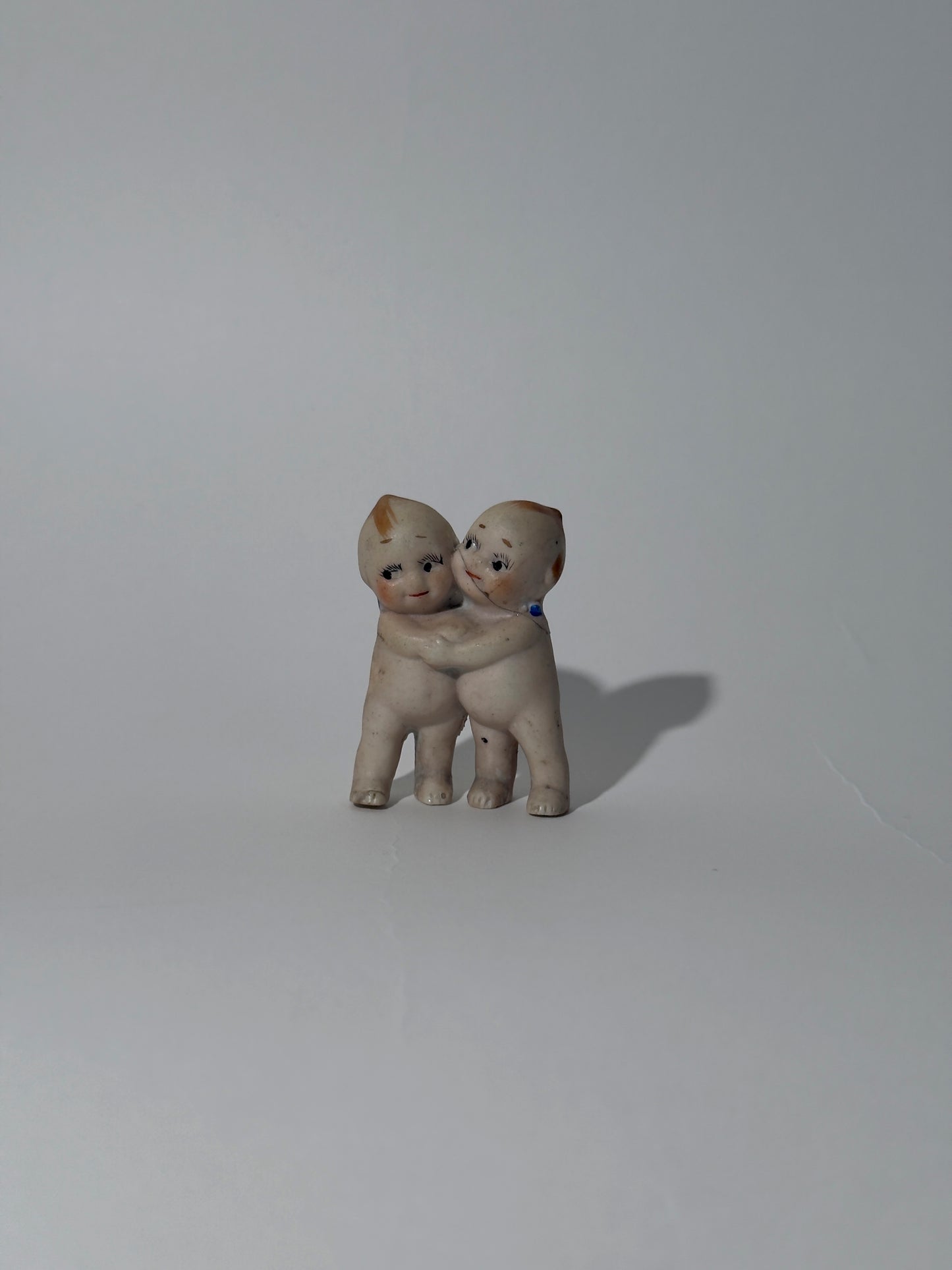 Hugging Kewpie Figurine