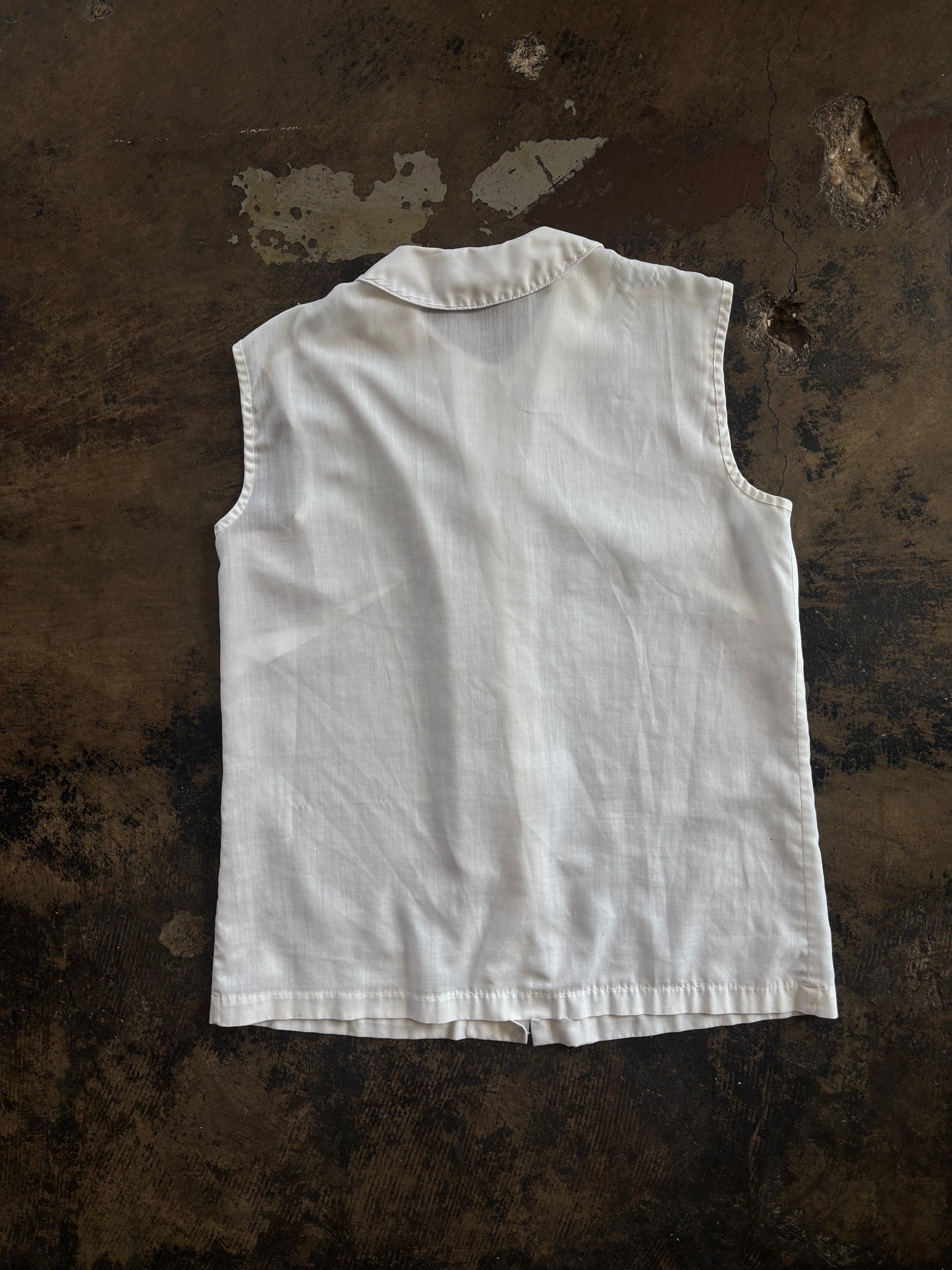 White Sleeveless Blouse