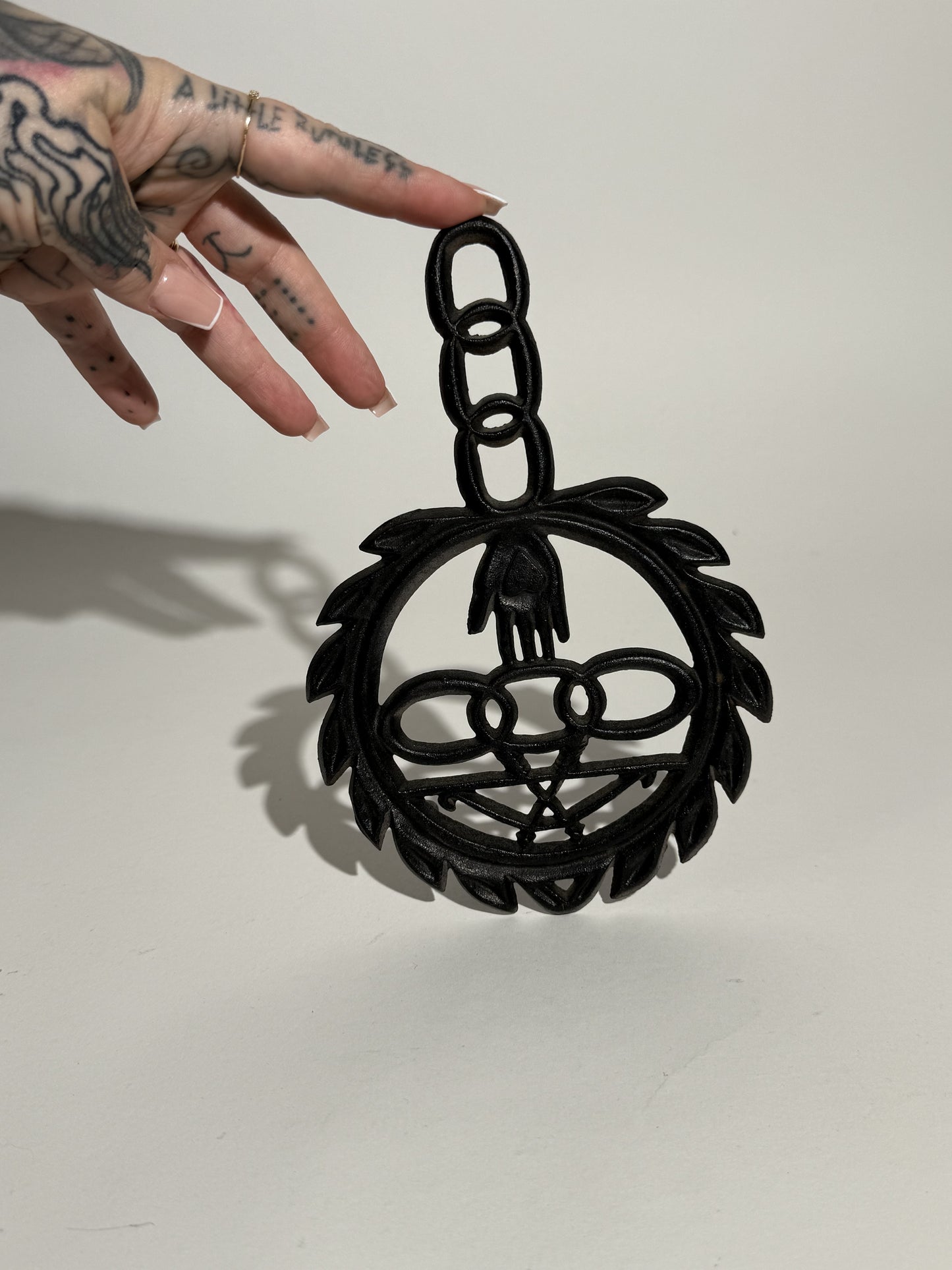 Iron Oddfellows Pot Holder