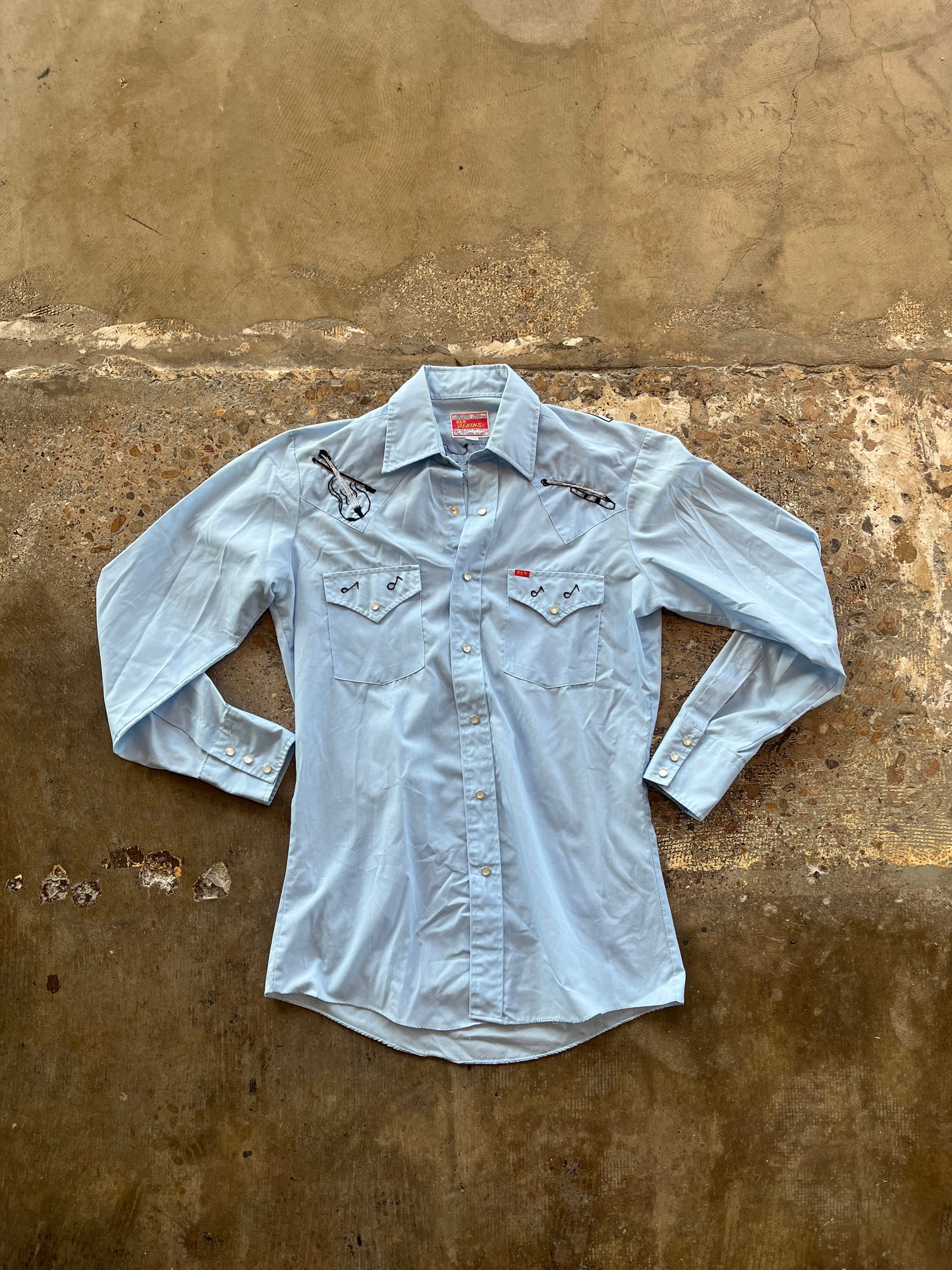 Ely Plains Blue Music Embroidered Pearl Snap