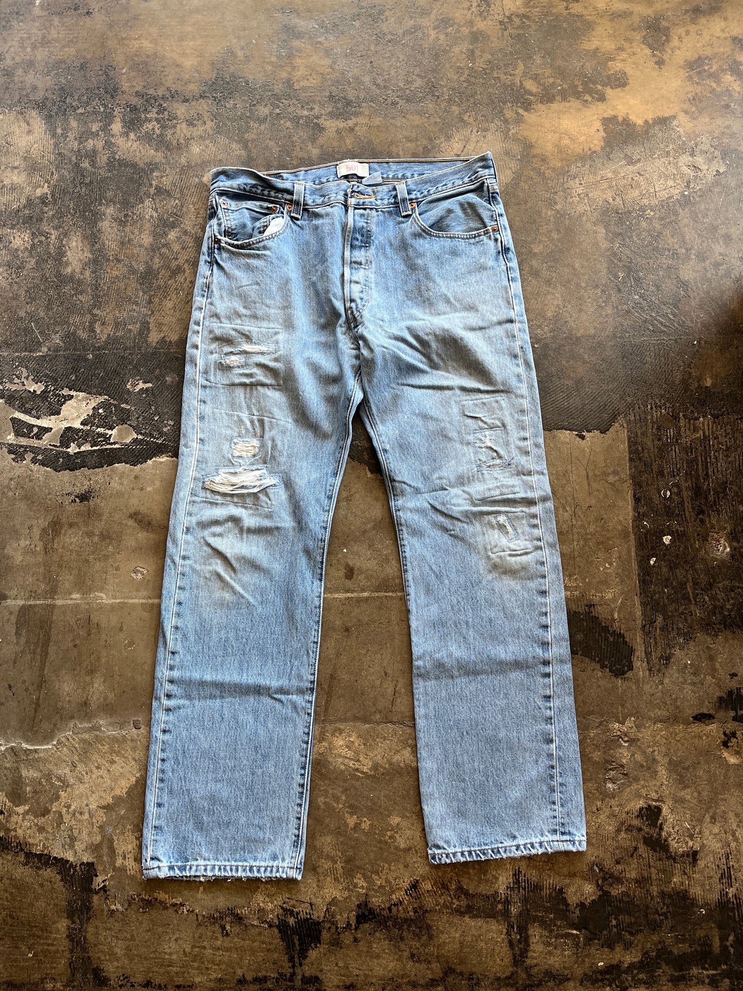 Distressed Levi 501 Jeans