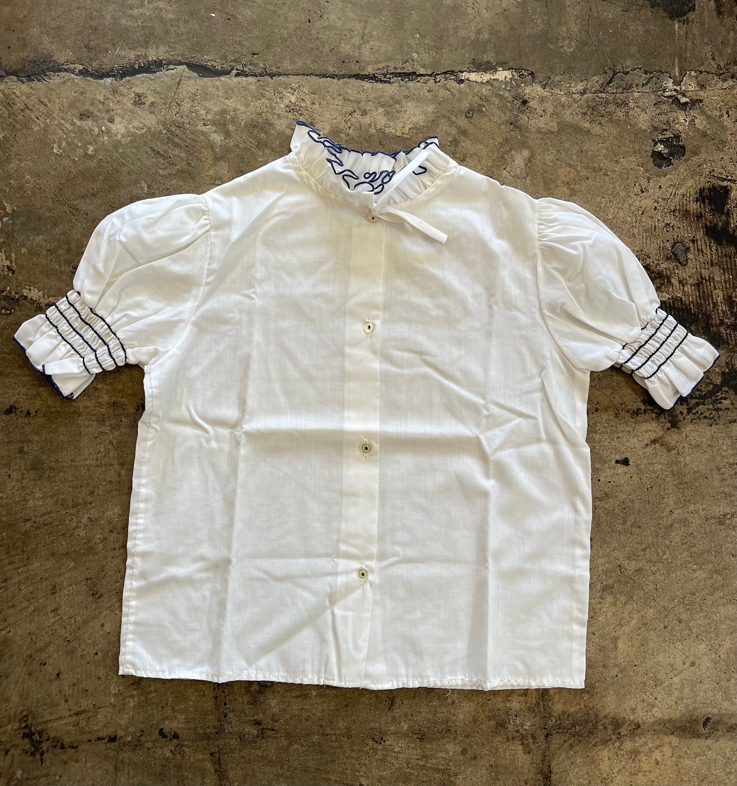 White Ruffle Navy Trim Blouse