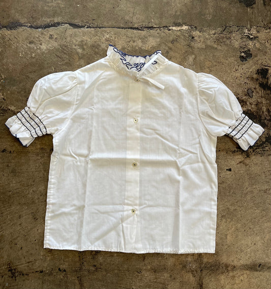 White Ruffle Navy Trim Blouse