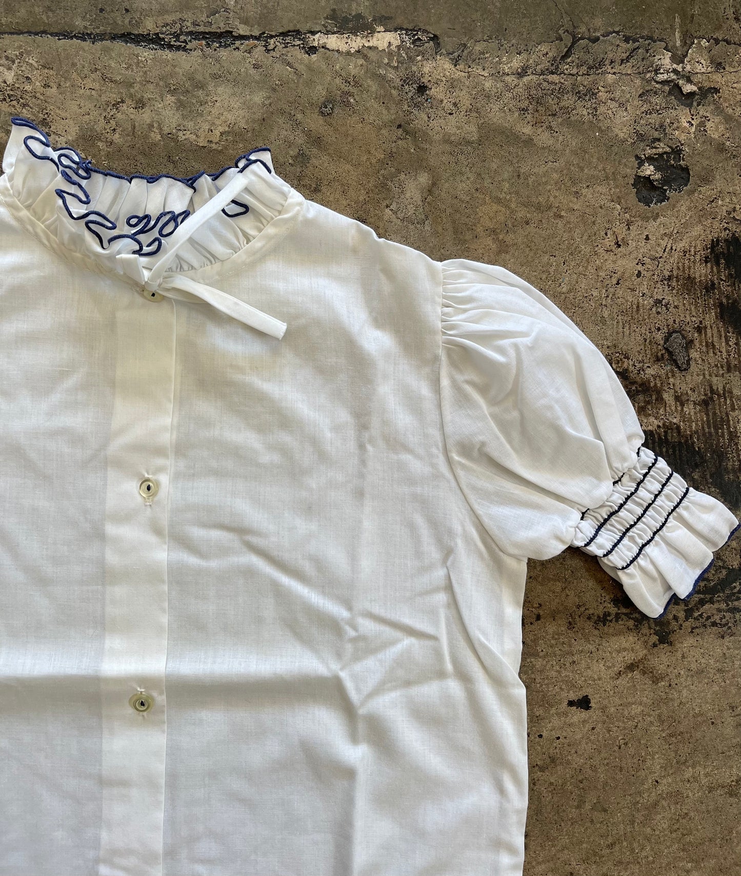 White Ruffle Navy Trim Blouse