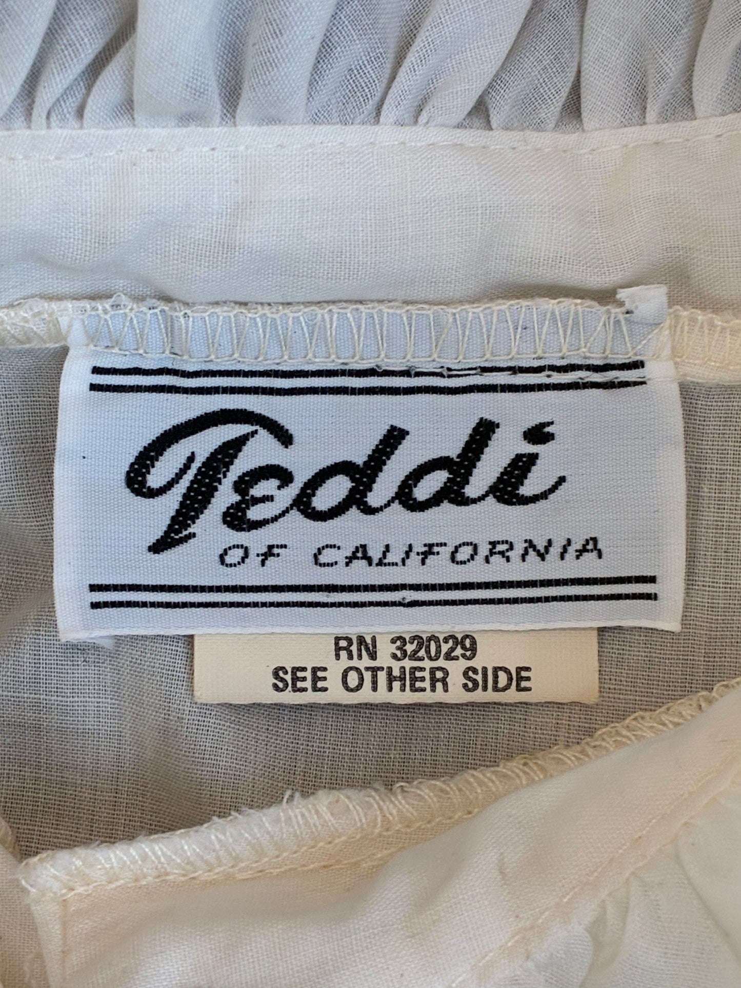 Cream Teddi of California Button Up Ruffle Long Sleeve
