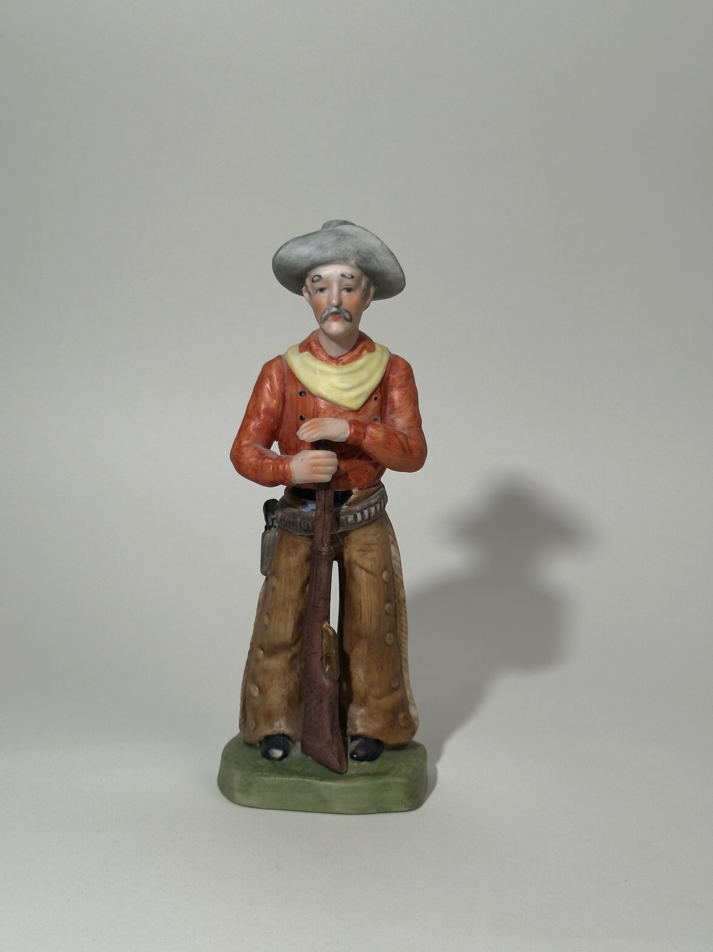 Porcelain Cowboy Figurine