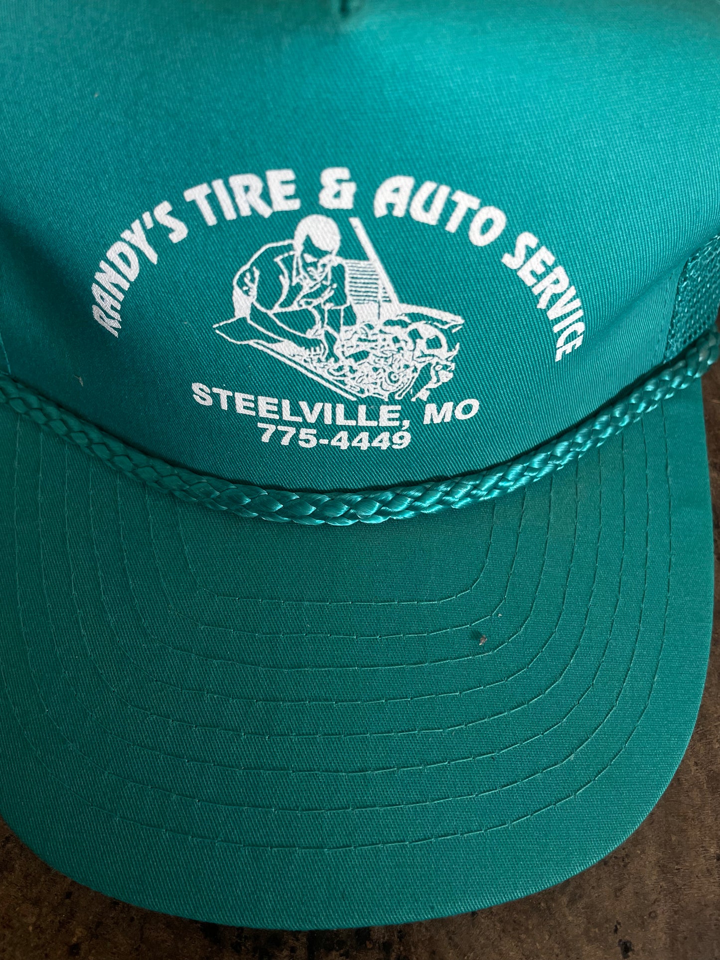 Teal Randy's Tire + Auto Service Trucker Hat