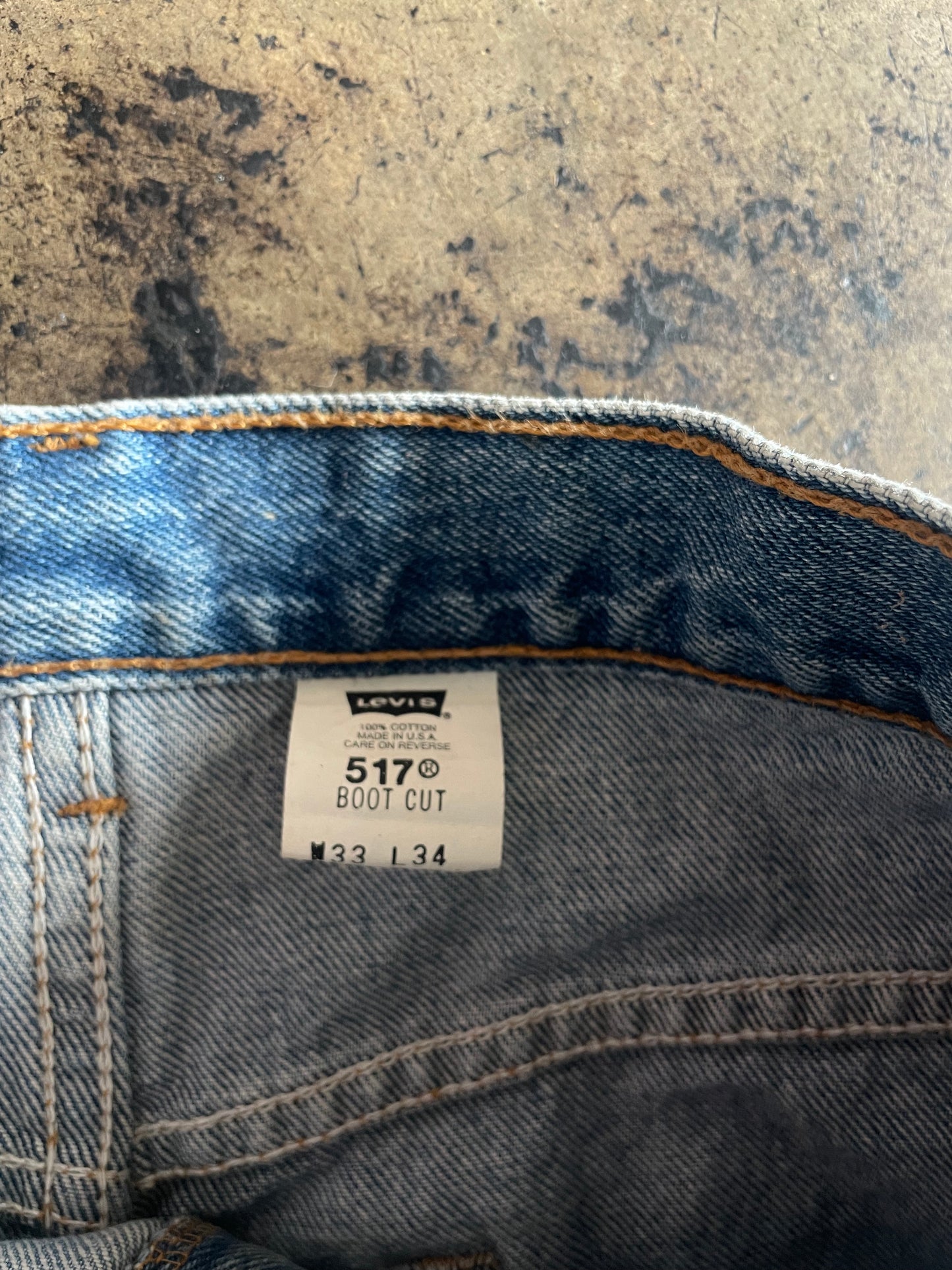 Distressed Levis 517 Boot Cut Blue Jeans