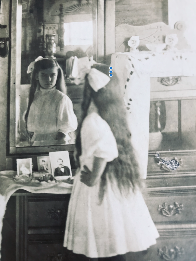 Vintage Photograph Of Girl Staring in Mirror