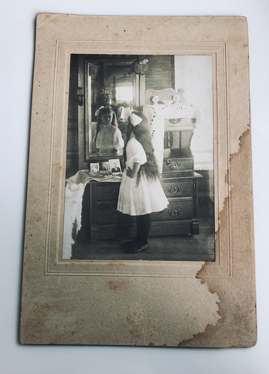 Vintage Photograph Of Girl Staring in Mirror